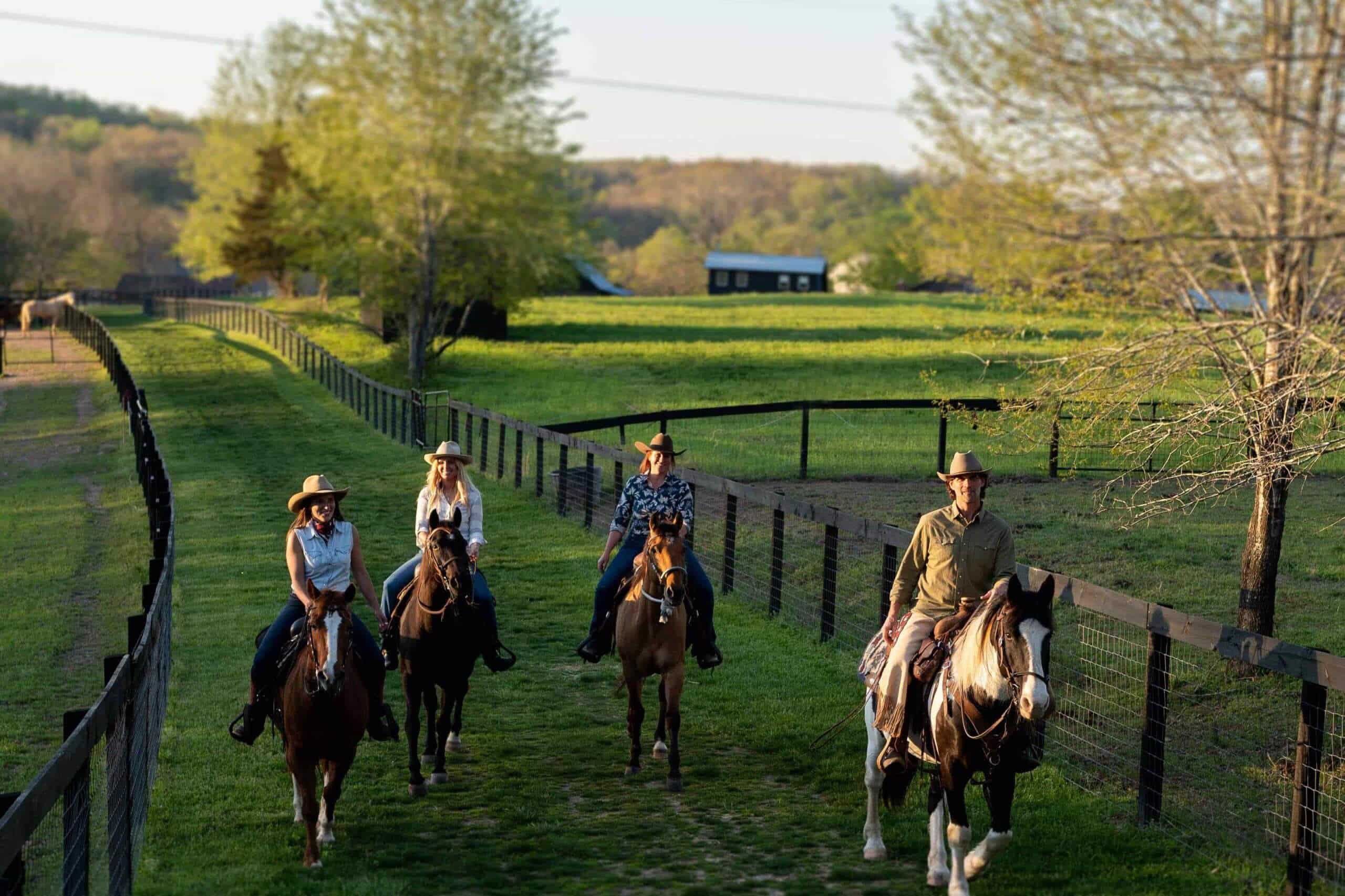 Miles and 3 others riding hourses
